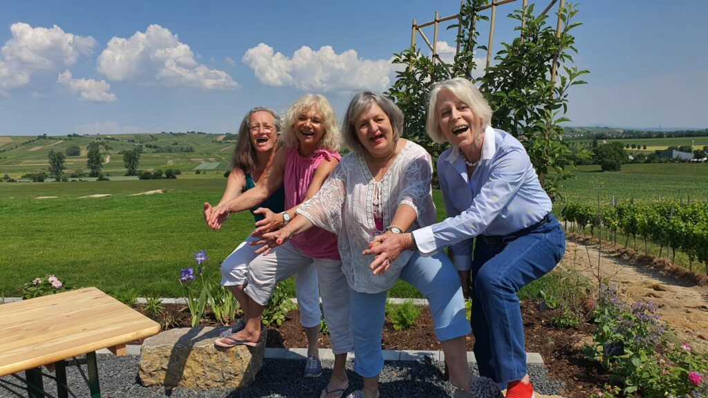 Susanne mit zufriedenen Kunden am energiehairday